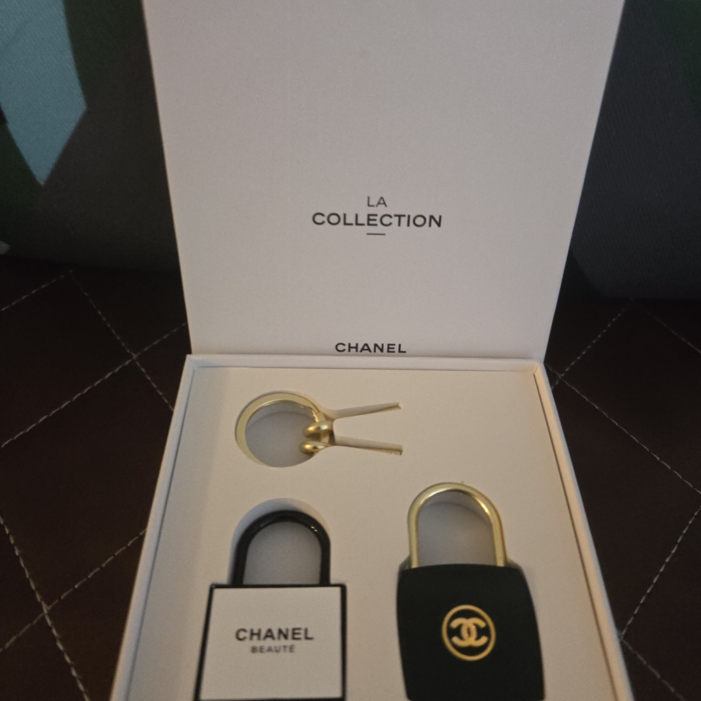 CHANEL Black and Gold Padlock Set